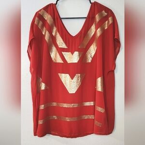 Chic Orange Blouse with Gold Accents